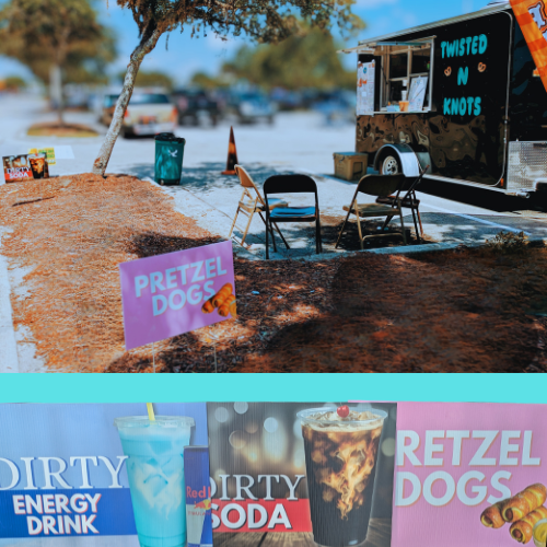 Outdoor food truck setup for Twisted N Knots with custom printed signage, including Pretzel Dogs and Dirty Soda menu boards, designed by Tru Visionz.