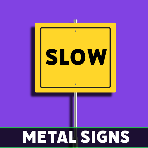 Yellow metal road sign with black text reading “Slow,” created by Tru Visionz.