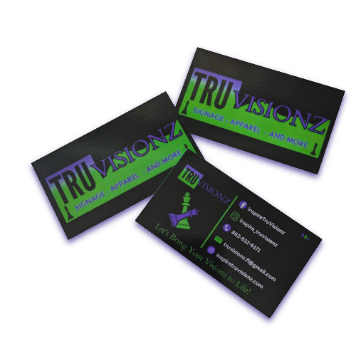 Tru Visionz custom business cards featuring logo, chess piece design, and brand colors green, black, and purple, with tagline “Signage, Apparel, and More.”