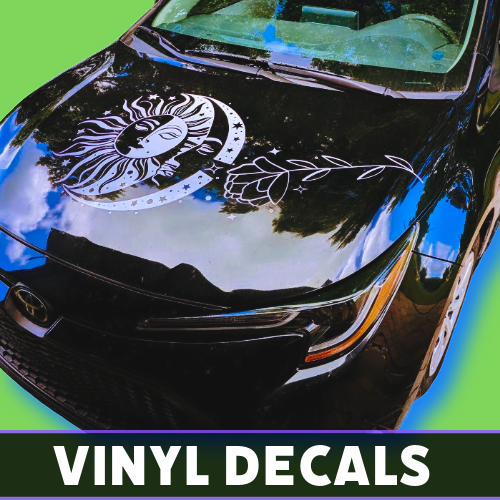 Glossy black car hood featuring white custom vinyl decal design by Tru Visionz.